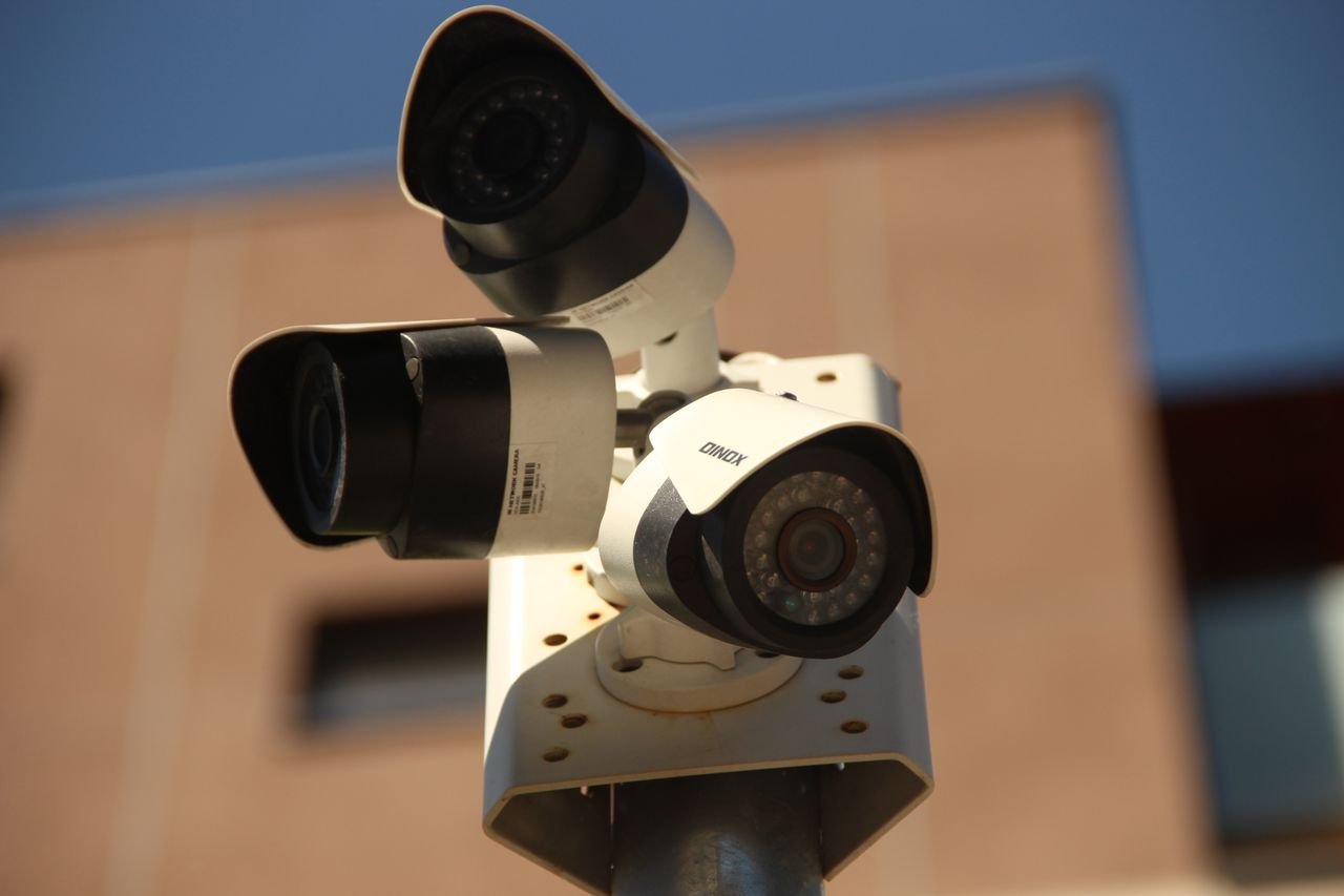 digital High-resolution surveillance cameras installed in a city environment for security purposes.